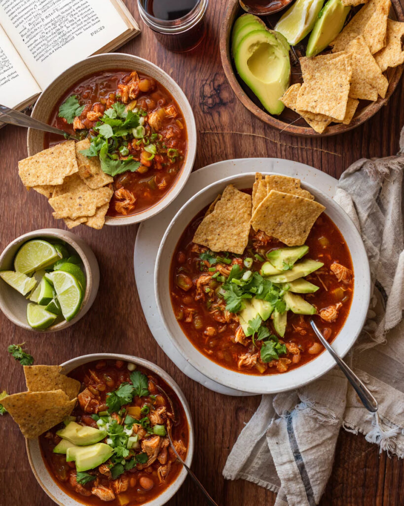 rotisserie chicken chili with toppings and chips